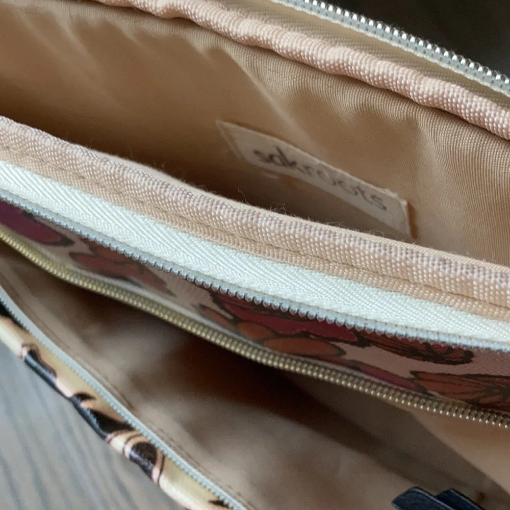 Sakroots coated canvas laptop case with bird print